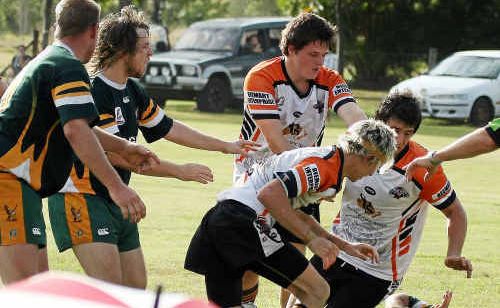 Avondale and Gin Gin players swarm in to this scuffle over the sideline after the final siren of elimination final at South Kolan on Sunday. Avondale and Gin Gin players swarm in to this scuffle over the sideline after the final siren of elimination final at South Kolan on Sunday.